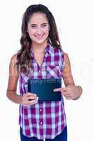 Happy pretty brunette showing tablet computer