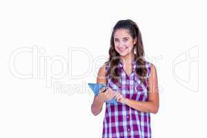 Happy pretty brunette using tablet computer