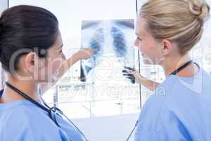 Doctors looking at Xray