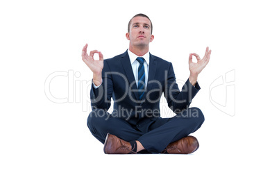 Zen businessman in yoga pose