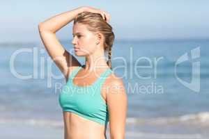 Beautiful fit woman relaxing at the beach