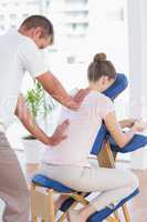 Woman having back massage