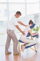 Woman having back massage