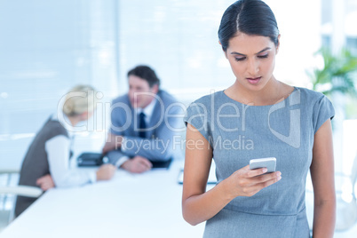 Businesswoman receiving bad news on her phone