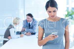 Businesswoman receiving bad news on her phone