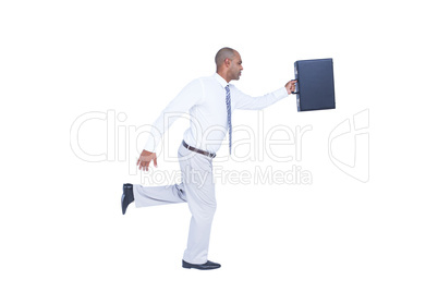 Businessman running and holding briefcase Businessman running and holding briefcase