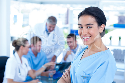 Beautiful smiling doctor looking at camera