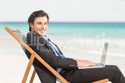 Businessman using his laptop