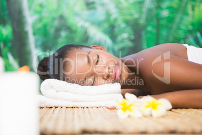 Beautiful woman lying on massage table