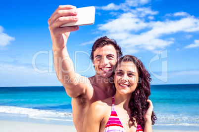 Happy couple taking selfie Happy couple taking selfie