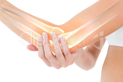 Highlighted bones of woman with elbow pain