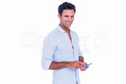 Handsome man using his smartphone