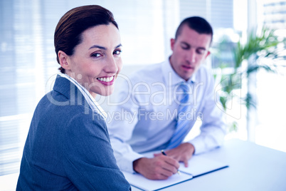 Businesswoman smiling at the camera Businesswoman smiling at the camera