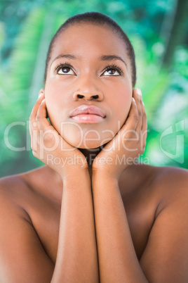 Pretty woman looking up on a background