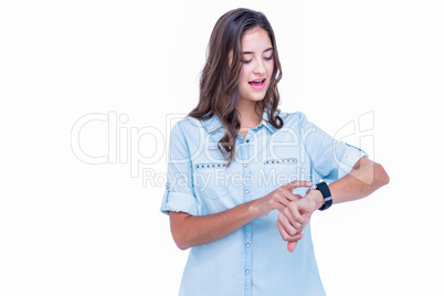 Pretty hipster using her smartwatch