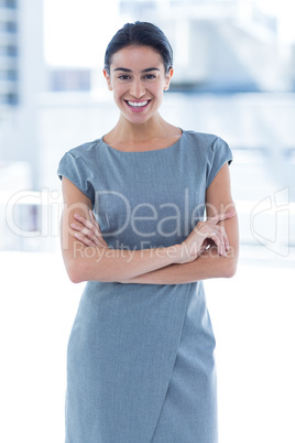 Smiling businesswoman with arms crossed Smiling businesswoman with arms crossed