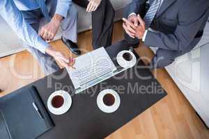 Business people with laptop and diary