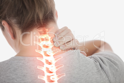 Highlighted spine of woman with neck pain