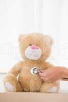 Teddy bear with doctor and stethoscope