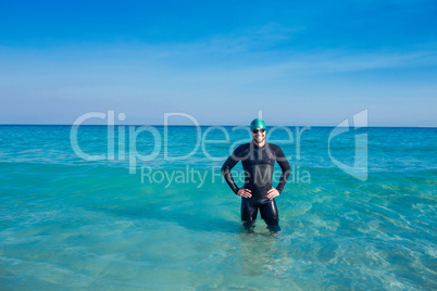 Smiling swimmer in the ocean