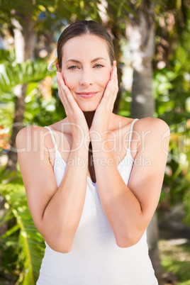 Beautiful young woman looking at camera