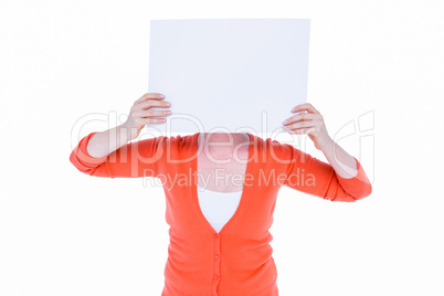 Woman hiding his head with blank paper