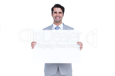 Businessman holding a white sign