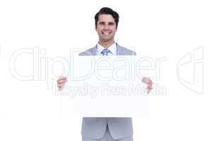 Businessman holding a white sign