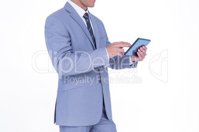 A businessman holding tablet computer