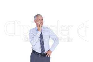 Thoughtful businessman with head on hand