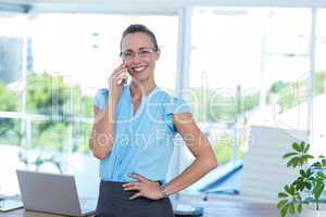 Smiling businesswoman having a phone call