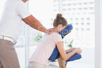 Woman receiving neck massage