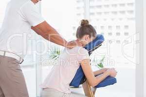 Woman receiving neck massage