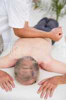 Physiotherapist doing back massage