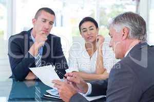 Business people in discussion in an office