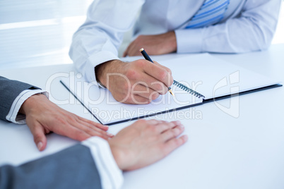 Business people in discussion in an office