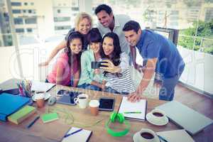 Creative business team taking a selfie