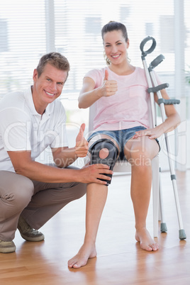 Doctor examining his patient knee