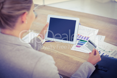 Businesswoman using digital tablet