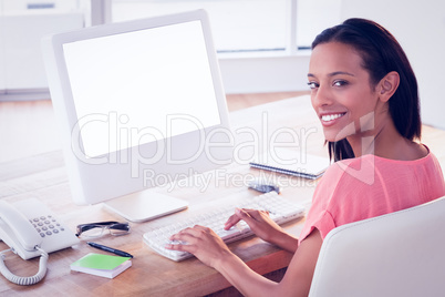 Pretty businesswoman smiling at the camera