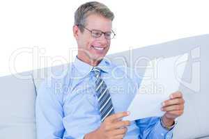 Focused businessman reading a document