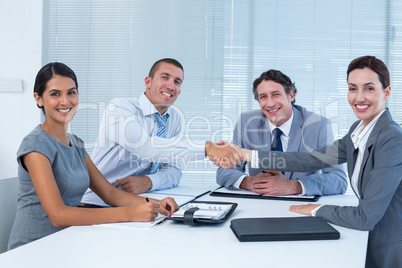 Business team greeting each other