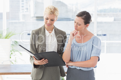 Businesswomen working together Businesswomen working together