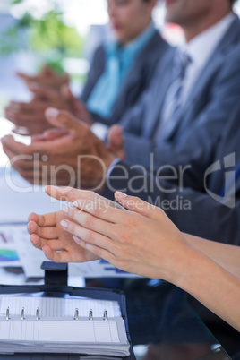 Business team clapping