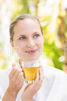 Attractive woman drinking tea