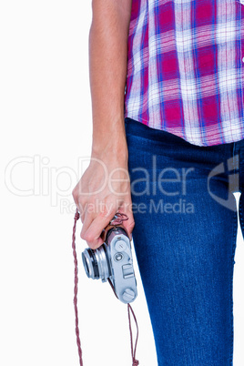 A woman holding photo camera