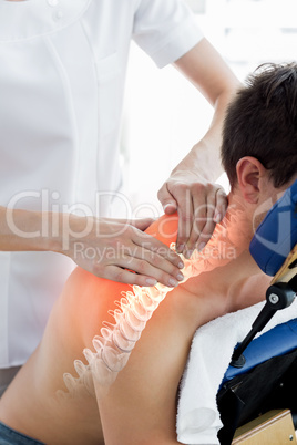 Highlighted spine of man at physiotherapy