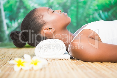 Side view of a beautiful woman on massage table