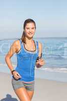 Fit woman doing jogging