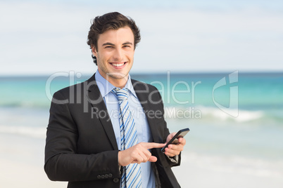 Businessman using his smartphone